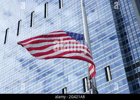 American flag of the United States of America  floating in the sky in Chicago, IL Stock Photo