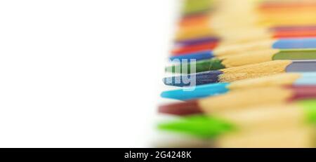 Selective focus to the color pencil, sharp school color pencils isolated on a white background, copy space photo Stock Photo