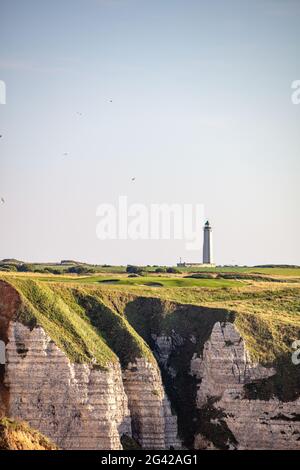 Lighthouse on the Alabaster Coast at Étretat, Normandy, France. Stock Photo