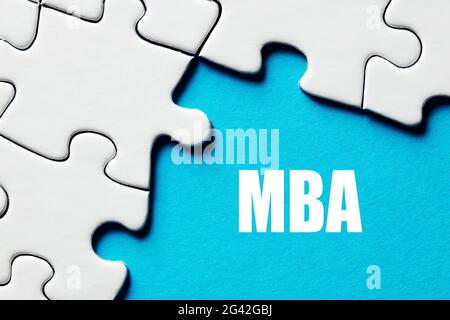 MBA master of business administration word surrounded by puzzle pieces. Education concept. Stock Photo