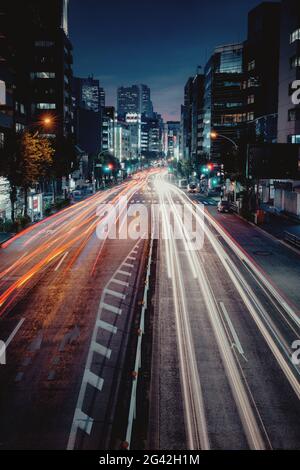 Long shot of rush hour car traffic in Osaka, Japan Stock Photo