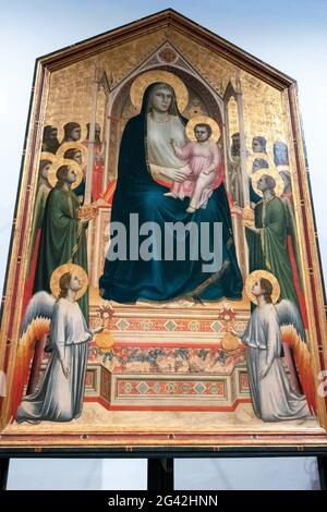 FLORENCE, TUSCANY/ITALY - OCTOBER 19 : Madonna and child enthroned with Angels and saints painting in the Uffizi gallery in Flor Stock Photo