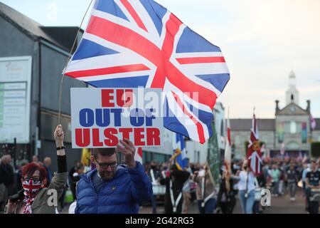 People take part in a Loyalist protest in Newtownards, County Down, against the Northern Ireland Protocol. Picture date: Friday June 18, 2021. Stock Photo