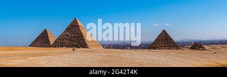 Pyramids of Khafre, Khufu and Menkaure in desert, Giza Pyramid Complex, Giza, Egypt Stock Photo