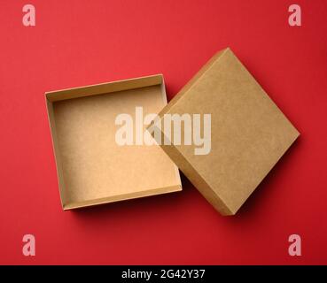 Empty square brown box on a red background, Stock Photo