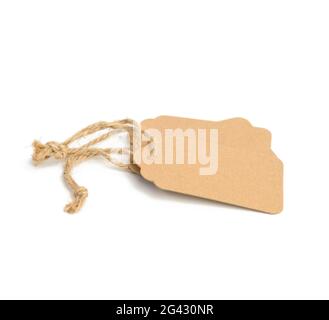 Blank brown rectangular brown paper tag on a rope isolated on white background Stock Photo