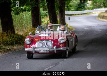 Orvieto, Italy. 18th June, 2021. A 1956 M.G. A. approaching Orvieto. Credit: Stephen Bisgrove/Alamy Live News Stock Photo