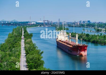 Montreal, CA - 7 June 2021: Aerial view of Federal Hudson bulk carrier moving on Saint-Lawrence seaway Stock Photo