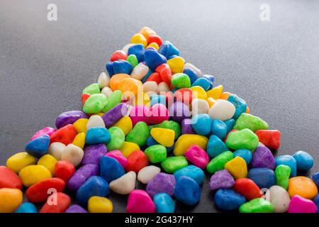 Pile of colorful pebbles as a stone background Stock Photo