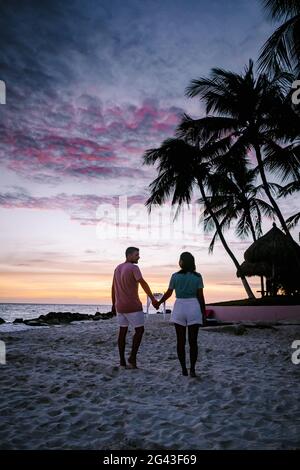 Sunset Aruba at Divi beach,colorful sunset at the beach in Aruba Stock Photo