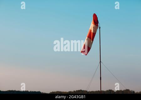 Airport windsock or wind cone for indication local wind direction Stock Photo