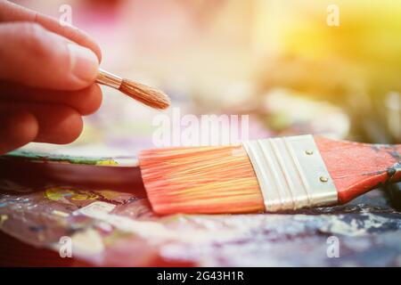 Painting artwork: paint brushes on painting background Stock Photo