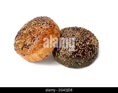 Two baked sesame seed buns isolated on white background Stock Photo