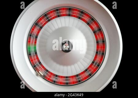 Casino roulette wheel isolated on Black background Stock Photo