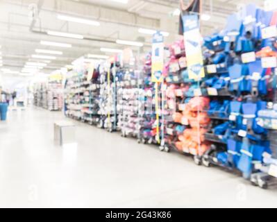 Blurred sport and travel hypermarket aisle Stock Photo