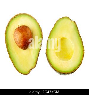 Cut in half avocado on a white background. Isolated. Stock Photo