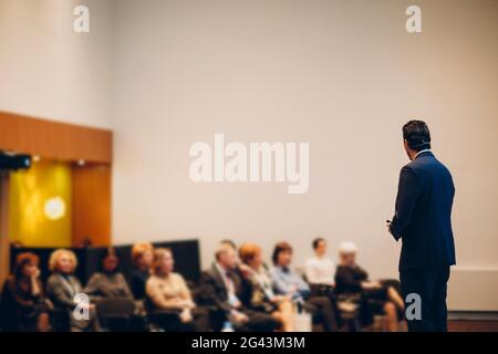 Speaker on stage in business conference. Stock Photo
