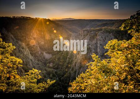 View from Hexentanzplatz into the Bodetal to Rosstrappe and Brocken in autumn at sunset, Thale, Harz, Saxony-Anhalt, Germany, Europe Stock Photo