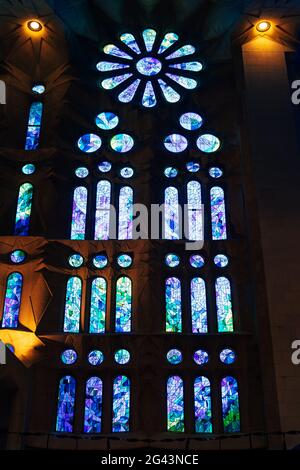 Barcelona, Spain - 15 December 2019: Stained windows from inside the Sagrada Familia in Barcelona, Spain. Stock Photo