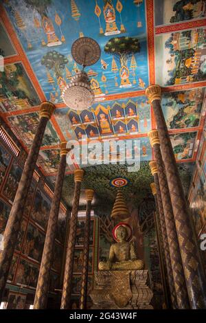 Beautiful painted ceiling and Buddha statue in Prasat Nokor Vimean Sour Temple, Oudong (Udong), Kampong Speu, Cambodia, Asia Stock Photo
