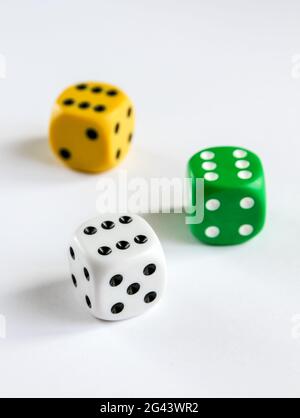 Three colorful dices isolated on white background Stock Photo