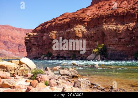 Stormy wide river with rapids Stock Photo