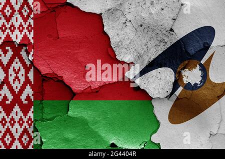 Flags of Belarus and Eurasian Economic Union painted on cracked wall Stock Photo