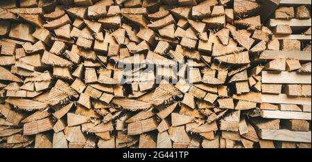 Wood pile background texture. Horizontal banner Stock Photo