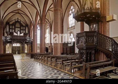 Interior view of St. Sixtus, neo-Gothic hall church with carved pulpit, Haltern am See, Germany Stock Photo