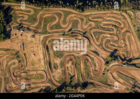 Overhead aerial view of the Cal Teuler motocross circuit, with the curves of the tracks (Bages, Barcelona, Catalonia, Spain) Stock Photo