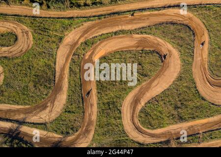 Overhead aerial view of the Cal Teuler motocross circuit, with the curves of the tracks (Bages, Barcelona, Catalonia, Spain) Stock Photo