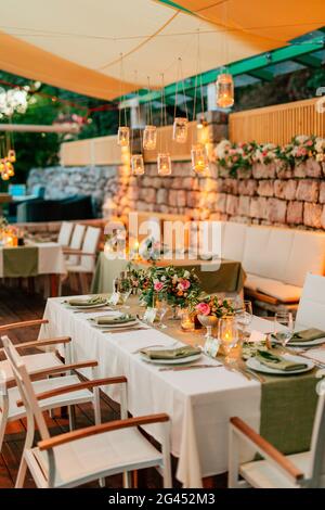 Wedding table in a rustic style with olives Stock Photo