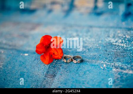 Wedding rings on a textured background Stock Photo