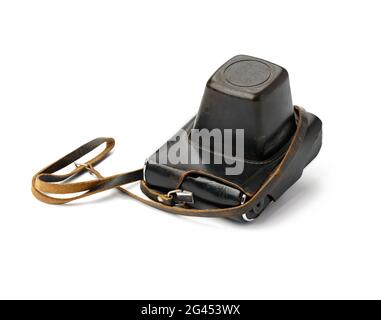 Vintage film camera in brown leather case with strap isolated on white background Stock Photo