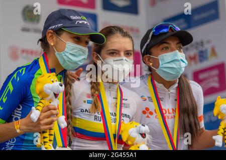 Pereira, Colombia. 18th June, 2021. Cyclists Lina Marcela Hernandez, Maria Camila Atahualpa and Erika Milena Botero at the award ceremony of the Women's Colombian National Road Race Championship in Pereira, Colombia on June 18, 2021. Credit: Long Visual Press/Alamy Live News Stock Photo