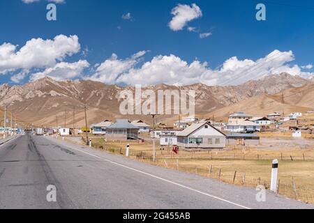 The view of small soviet age remote village in Kyrgyzstan Stock Photo