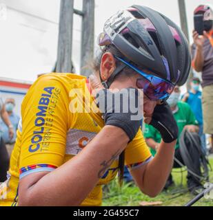 Pereira, Colombia. 18th June, 2021. Yeni Lorena Colmenares, from the Colombia Tierra de Atletas team cries her victory after finishing the Women's Colombian National Road Race Championship in Pereira, Colombia on June 18, 2021. Credit: Long Visual Press/Alamy Live News Stock Photo