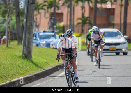 Pereira, Colombia. 18th June, 2021. Cyclists from the Colnago team participate in the Women's Colombian National Road Race Championship in the streets de Pereira, Colombia on June 18, 2021 Credit: Long Visual Press/Alamy Live News Stock Photo