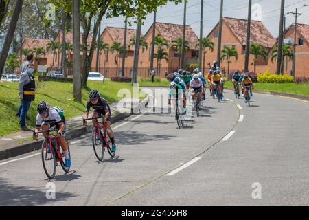 Pereira, Colombia. 18th June, 2021. Cyclists from the Antioquia Cycling leage participate in the Women's Colombian National Road Race Championship in the streets de Pereira, Colombia on June 18, 2021 Credit: Long Visual Press/Alamy Live News Stock Photo