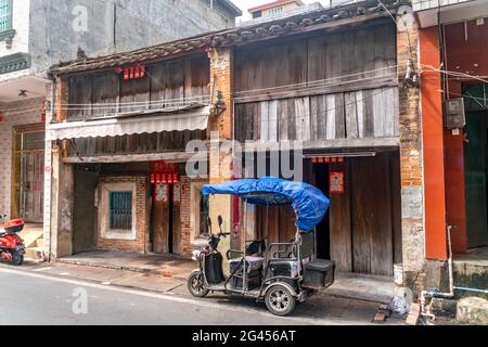 The rural street view of old traditional river fisherman village on Hainan in China Stock Photo