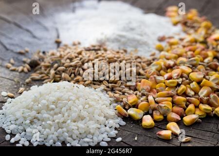 Grains food mix on wooden background Stock Photo