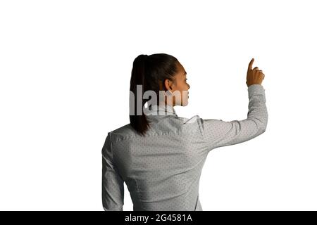 Businesswoman using interactive screen Stock Photo