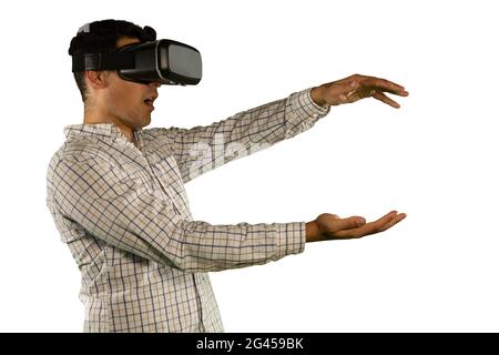 Young businessman using a VR headset Stock Photo