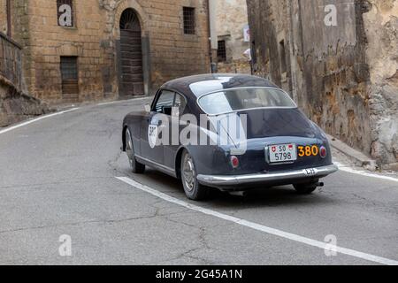 Orvieto, Italy. 18th June, 2021. A 1957 Lancia Aurelia B20 GT 2500 in the streets of Orvieto. Credit: Stephen Bisgrove/Alamy Live News Stock Photo