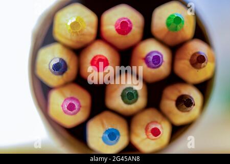 top view of color pencils for artwork isolated on white background. Stock Photo
