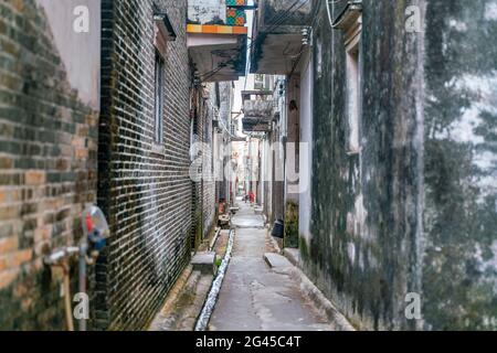 The rural street view of old traditional fisherman village on Hainan in China Stock Photo