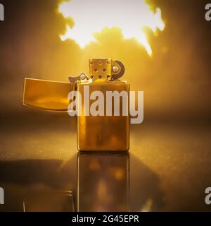a lighter from which fire comes out Stock Photo