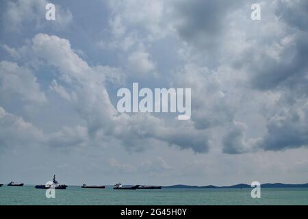 Tugboat sailing in the sea. Tugboat making maneuvers, Tanjung Pinang Riau Islands Stock Photo