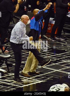 Los Angeles, USA. 19th June, 2021. Los Angeles Clippers owner Steve Ballmer (blue shirt) celebrates at the end of Games 6 of the Clippers best-of-seven second-round playoff series matchup against the Utah Jazz at Staples Center in Los Angeles on Friday, June 18, 2021. The Clippers eliminated the top-seeded Jazz with a 131-119 win in front of Los Angeles' biggest NBA crowd since the pandemic shut down sports in March 2020. Photo by Jim Ruymen/UPI Credit: UPI/Alamy Live News Stock Photo