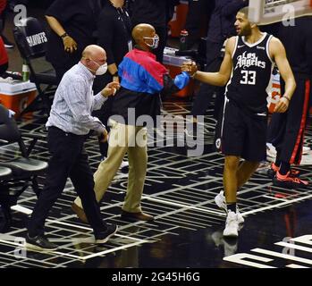 Los Angeles, USA. 19th June, 2021. Los Angeles Clippers owner Steve Ballmer (blue shirt) celebrates at the end of Games 6 of the Clippers best-of-seven second-round playoff series matchup against the Utah Jazz at Staples Center in Los Angeles on Friday, June 18, 2021. The Clippers eliminated the top-seeded Jazz with a 131-119 win in front of Los Angeles' biggest NBA crowd since the pandemic shut down sports in March 2020. Photo by Jim Ruymen/UPI Credit: UPI/Alamy Live News Stock Photo